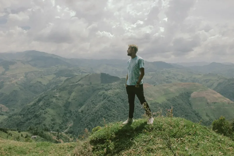 A man sitting quietly in nature